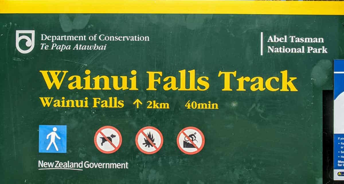 Wainui Falls Track sign in Abel Tasman National Park