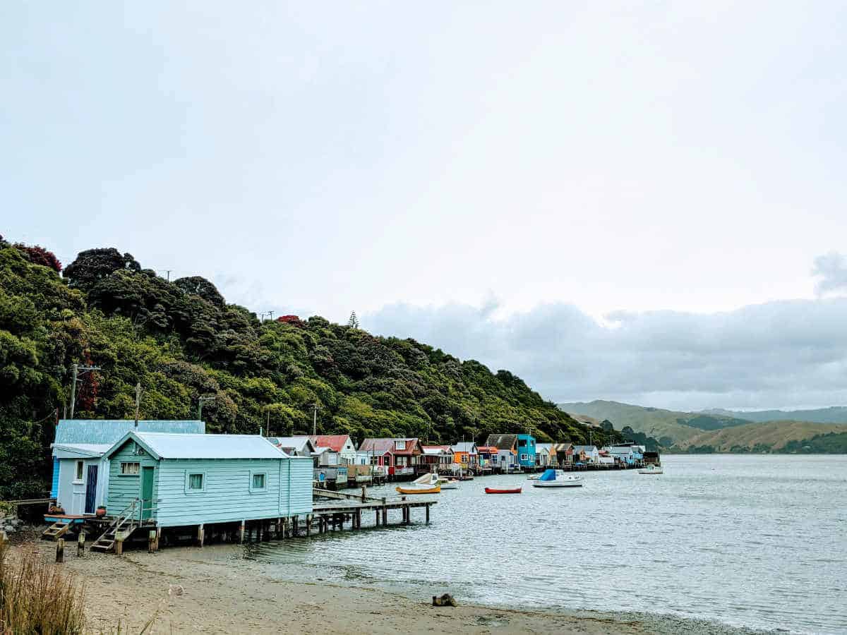 Boatsheds along the shore of Porirua Harbour