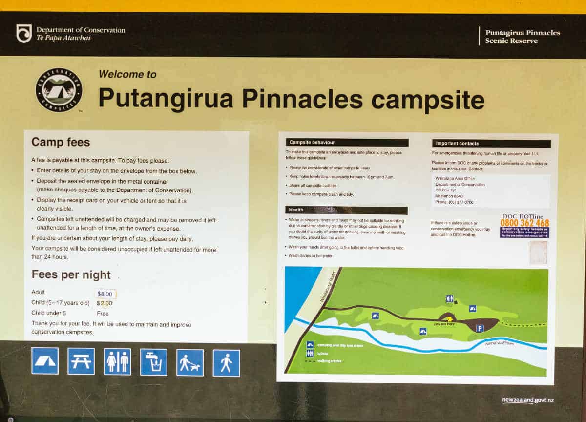 Sign from the Department of Conservation with information on the Putangirua Pinnacles campsite.